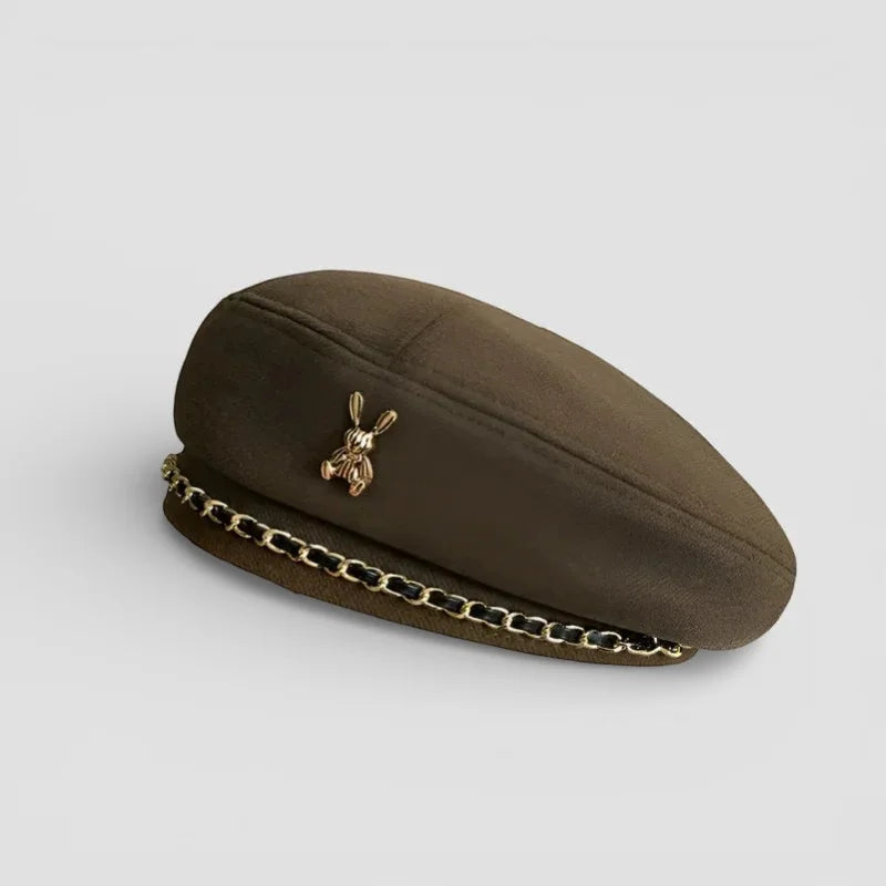 Bunny Beret: olive green beret with gold bunny pin and black-gold chain trim