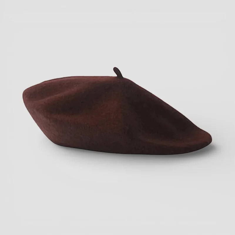 Chocolate brown suede-like beret with black button top detail
