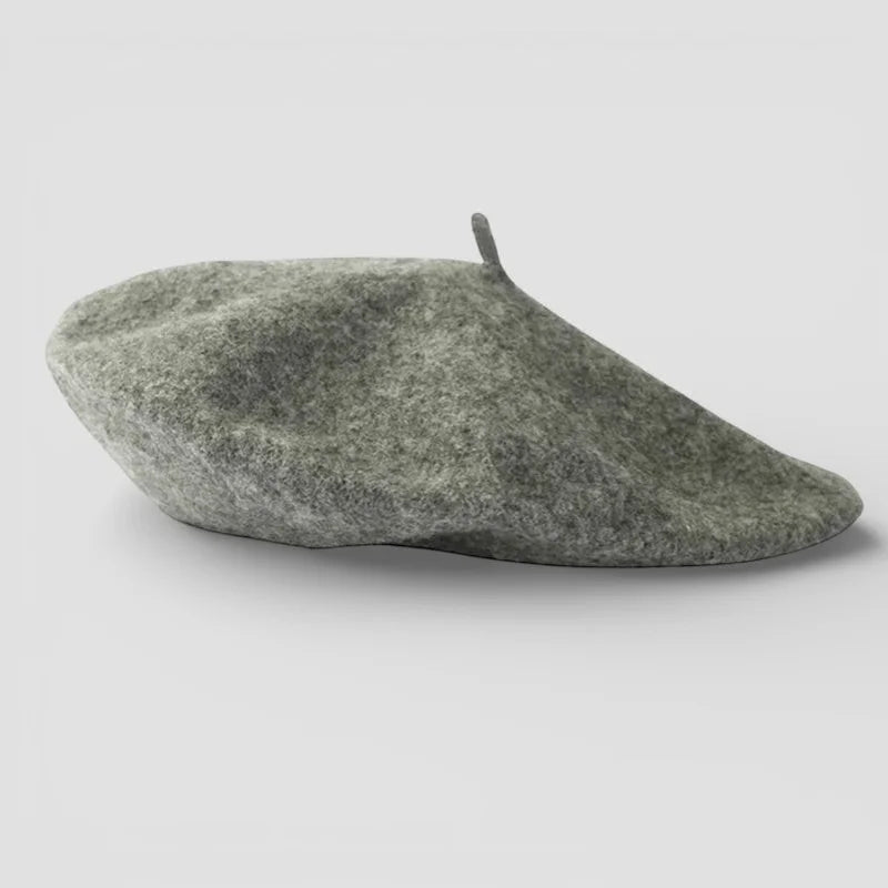 Classic French Beret in soft olive-green felt with textured surface and top button
