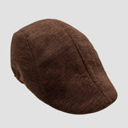 Brown flat cap.