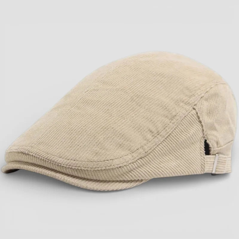 Beige corduroy flat beret cap with curved brim and adjustable strap