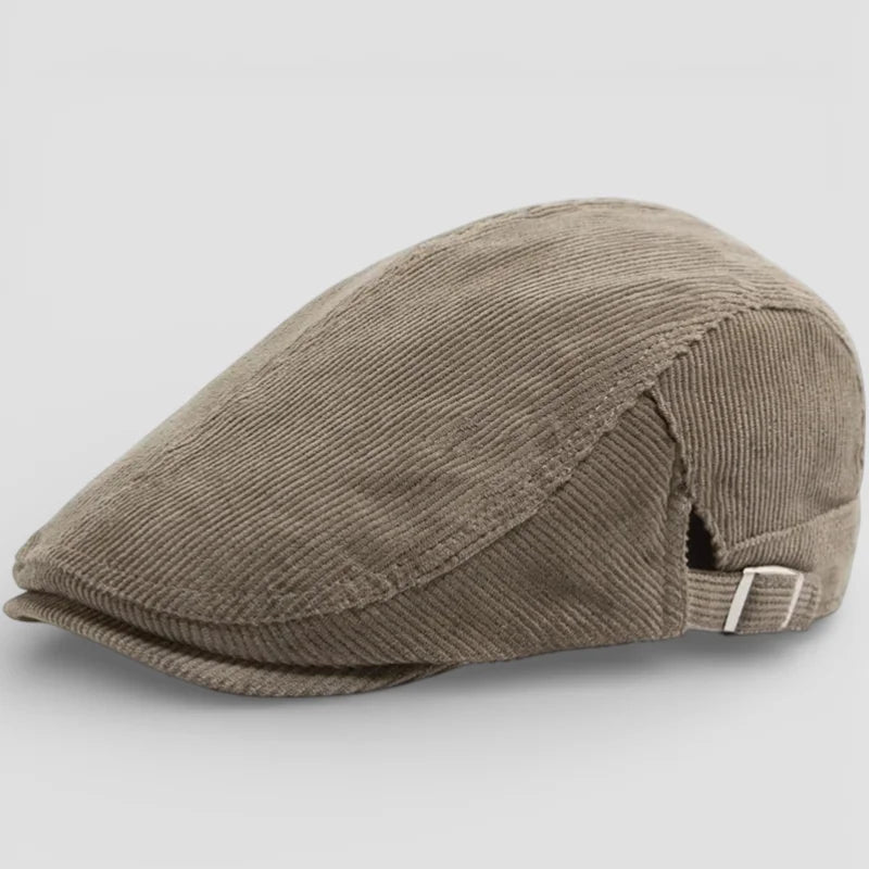 Beige corduroy flat beret cap with ribbed texture and adjustable strap