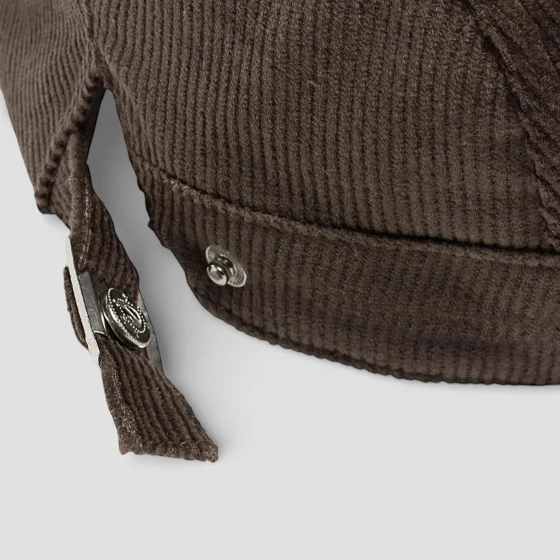 Brown corduroy beret cap with silver button and adjustable strap