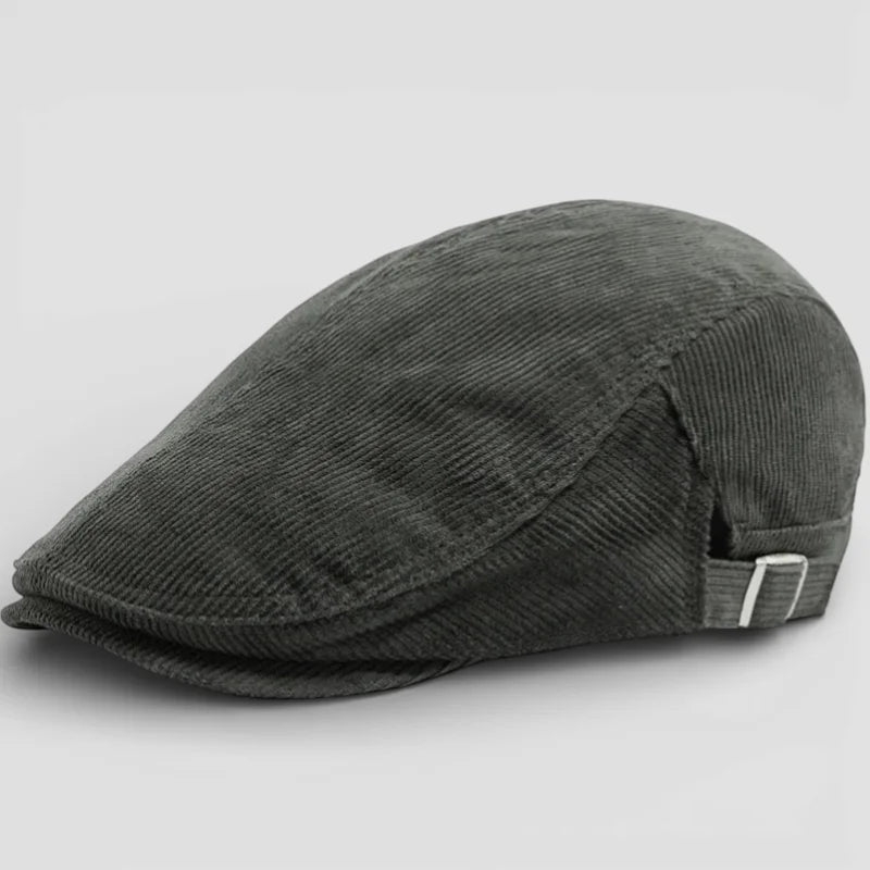 Dark gray corduroy flat cap with subtle texture and adjustable strap
