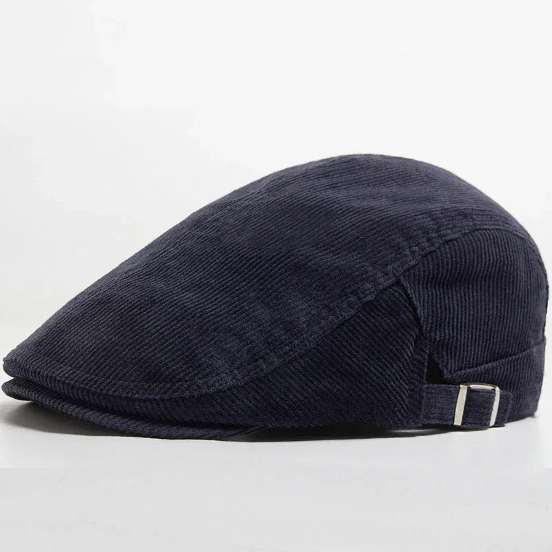 Navy corduroy flat cap.