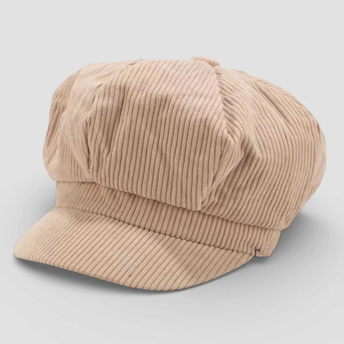 Beige corduroy newsboy cap with ribbed texture and short brim