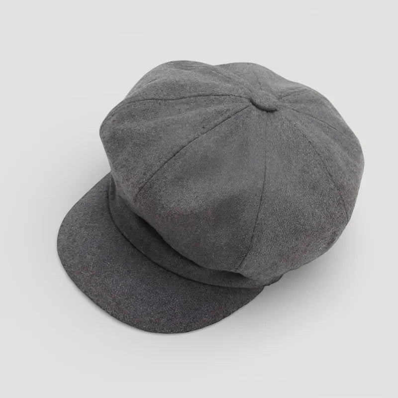 Dark gray textured woolen flat cap with structured crown and short brim
