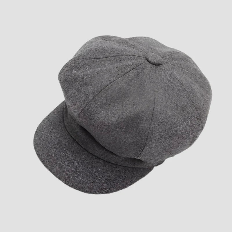 Gray newsboy cap.