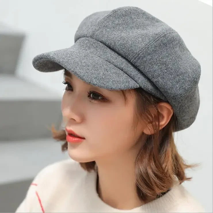 Gray wool newsboy cap.