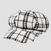 Black and white plaid newsboy cap.