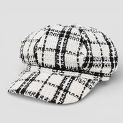 Classic black and white houndstooth crochet beret cap, six-panel design
