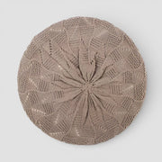 Beige crochet beret with intricate lace pattern radiating from center