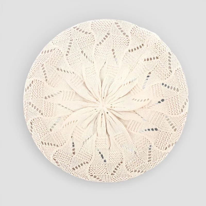Delicate off-white crochet beret pattern with radiating floral lace headpiece
