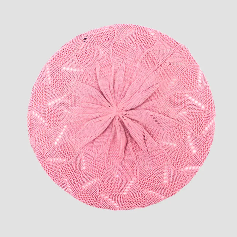 Pink knitted beret.