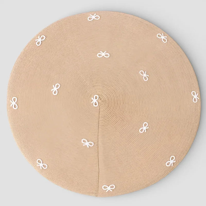Beige circular tree skirt with white bow embroidery for Crochet Beret with Bow