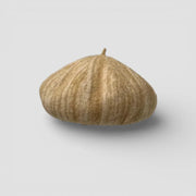 Custom light brown textured beret with ridges and tuft top