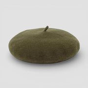 Dark green felt beret with olive tone, soft texture and central button