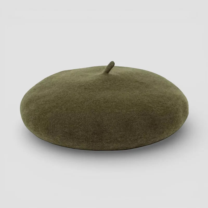 Dark green felt beret with olive tone, soft texture and central button