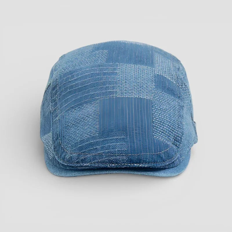 Blue denim beret cap with textured woven pattern and subtle stitching
