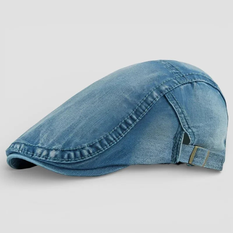 Light blue denim beret hat with worn texture and stitched seams