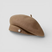 Tan felted wool beret with side button and stiff brim
