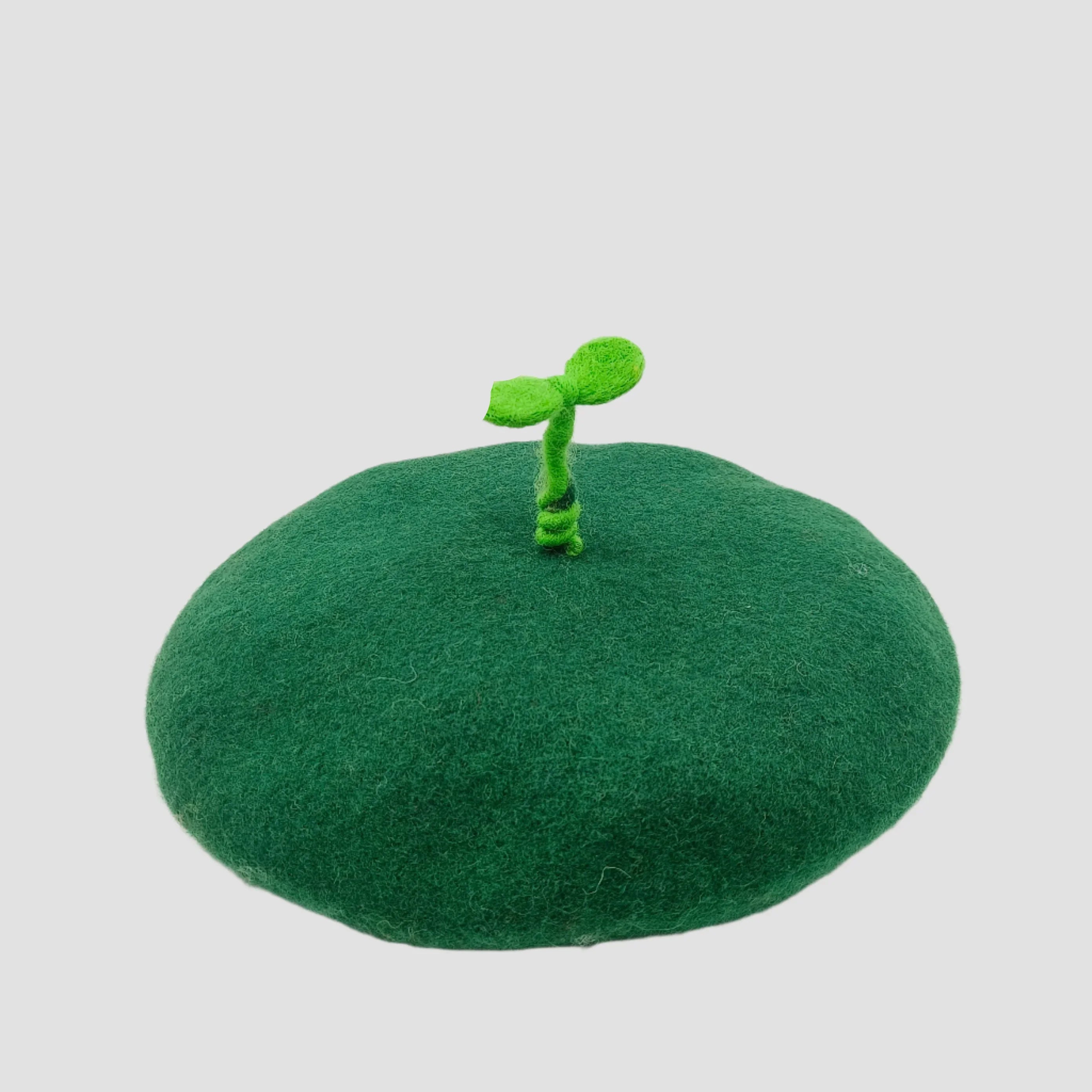 Green beret with sprout.
