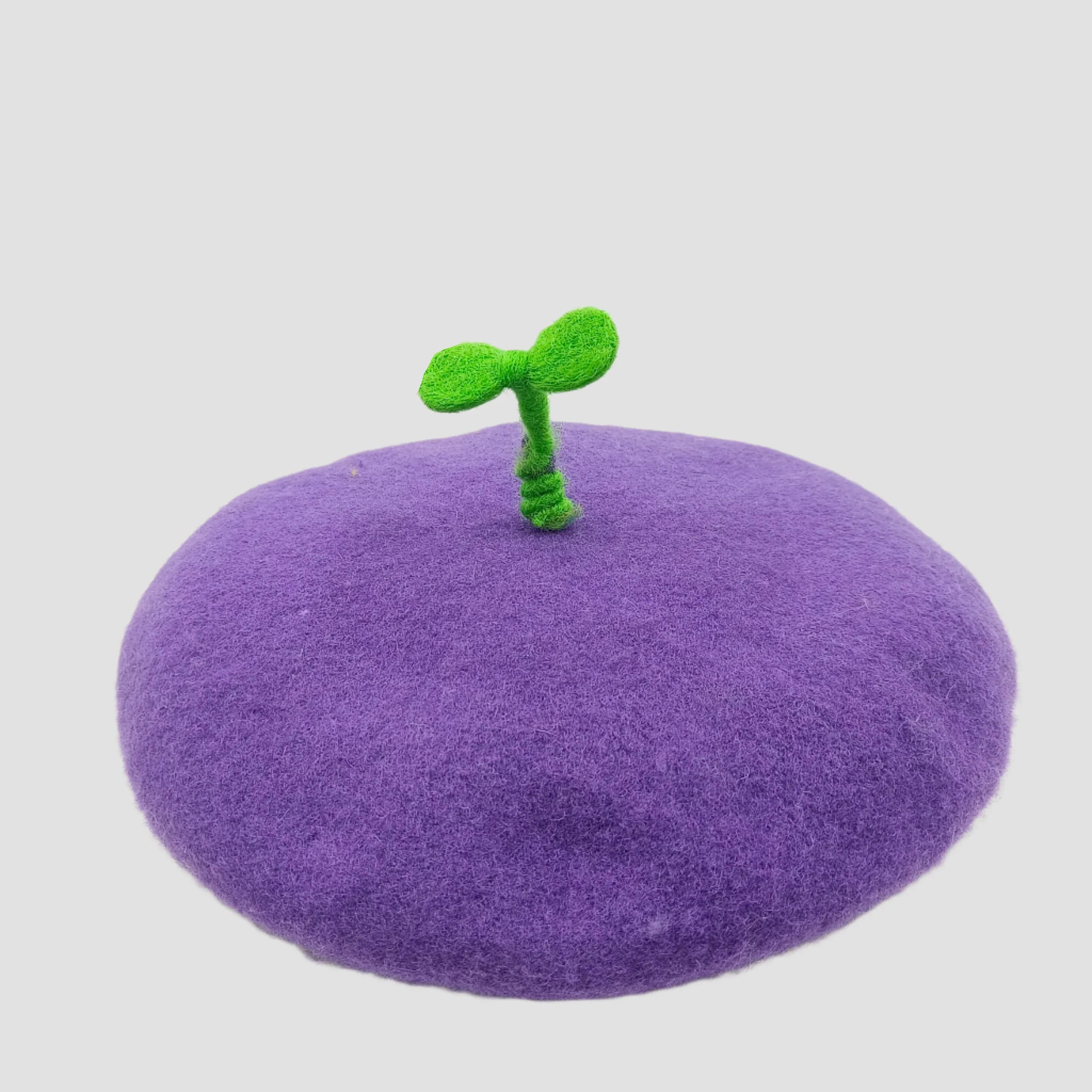 Purple beret with green sprout.