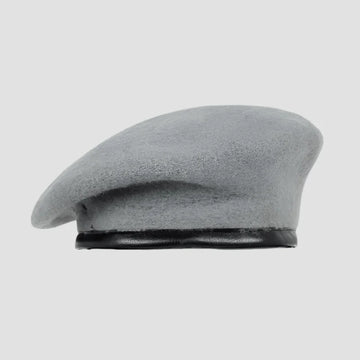 Gray wool beret with black trim.