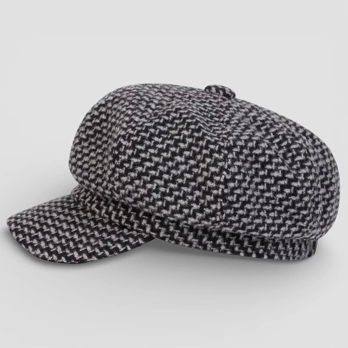 Classic black and white herringbone French beret cap, six-panel wool design