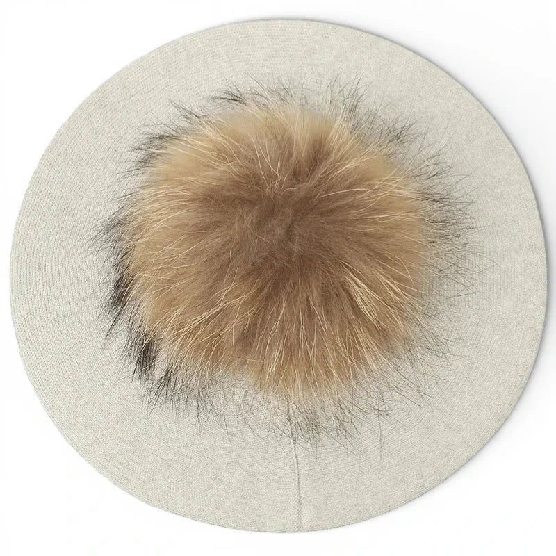 French beret with beige base and fluffy light brown fox fur pom-pom