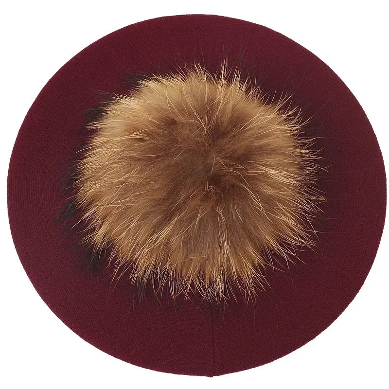 Burgundy beret with fur pompom.