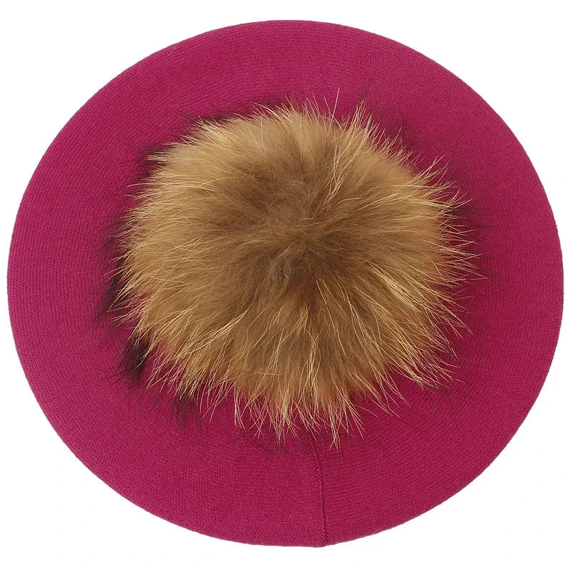 Fuchsia beret with fur pompom.