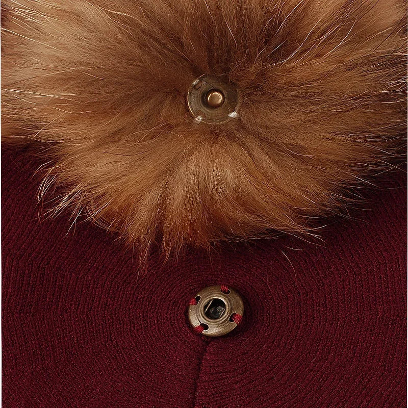 Maroon fabric with fur trim and metal snaps.