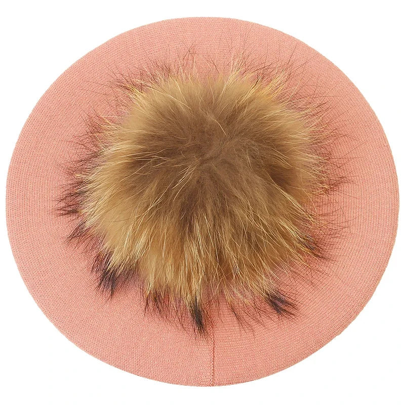 Pink beret with fur pompom.