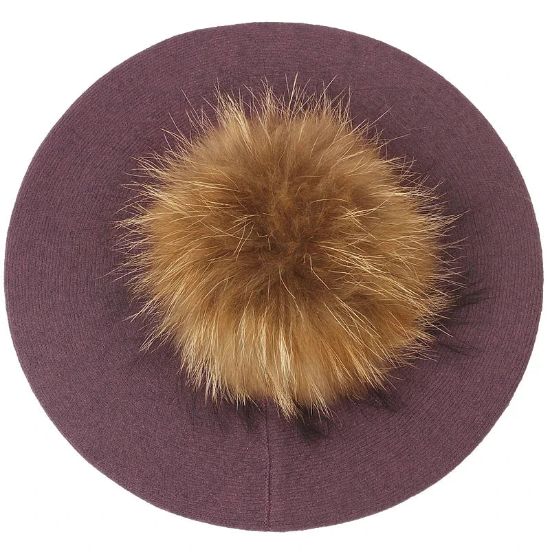 Purple beret with fur pompom.