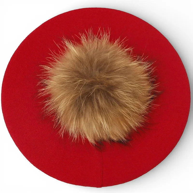 Vibrant red French beret with fluffy tan fur pom-pom