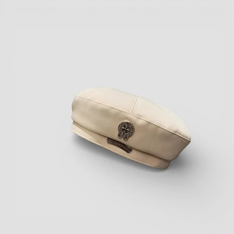 French Fashion Beret: cream-colored with metallic emblem and leather strap