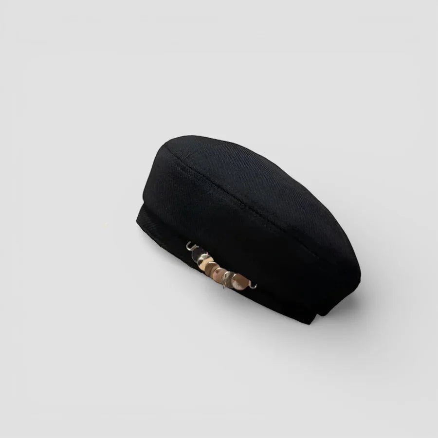 French Legion Beret: black textured fabric with metallic and wooden bead clasp