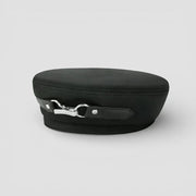 Back view of French Made Beret black fabric cap with silver clasp and leather strap