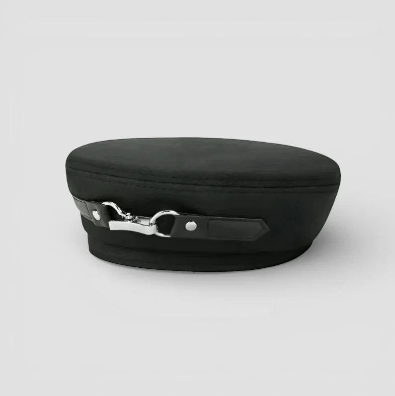Back view of French Made Beret black fabric cap with silver clasp and leather strap