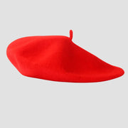 Red beret hat.