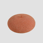 Terracotta French wool beret with herringbone weave pattern