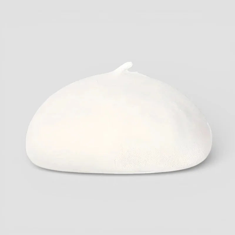 Soft off-white Fur Beret Hat with textured surface and curved brim