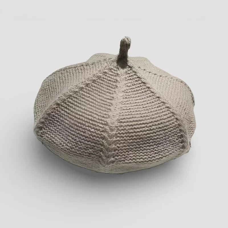 Gray knitted pumpkin ceramic sculpture named Genuine French Beret