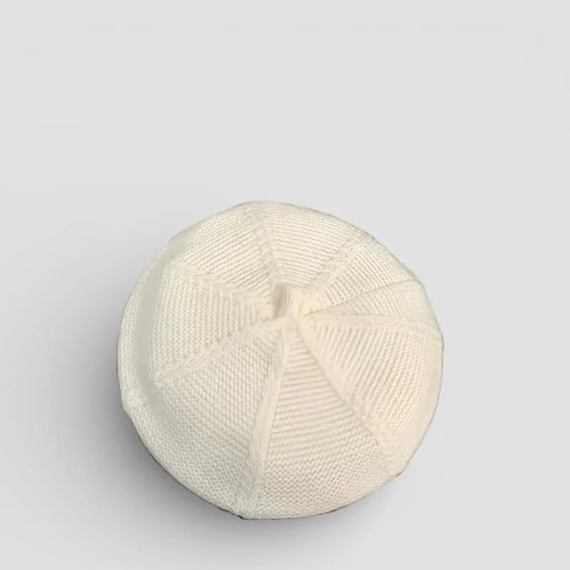 Off-white ribbed knitted kippah with radial stitching in Genuine French Beret