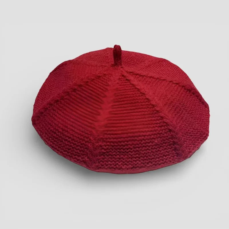 Genuine French red knitted beret with ribbed texture and top loop