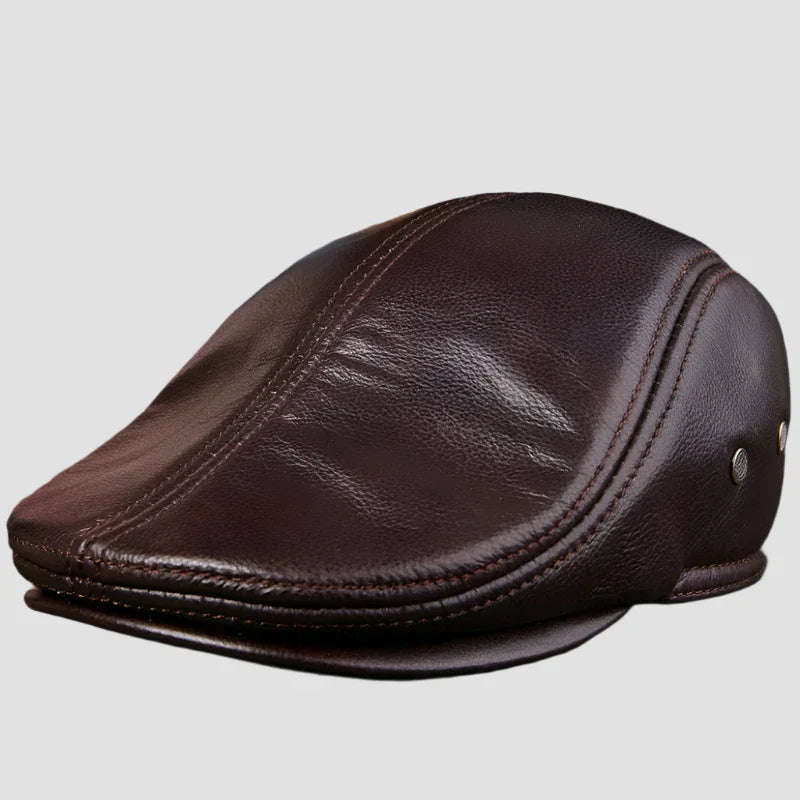 Brown leather flat cap.