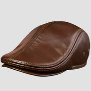 Brown leather flat cap.