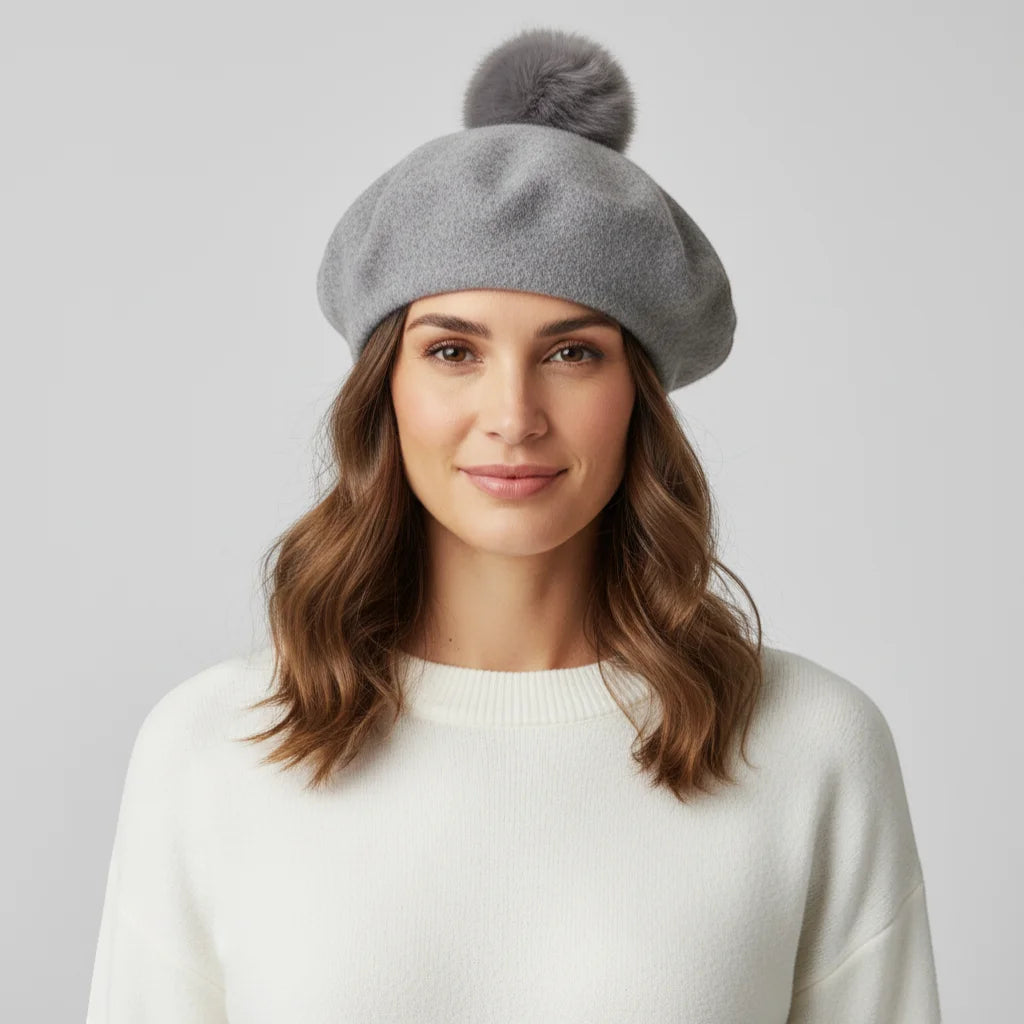 Gray felt beret with fluffy gray pom-pom on top