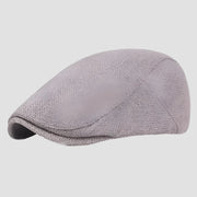 Gray flat cap.